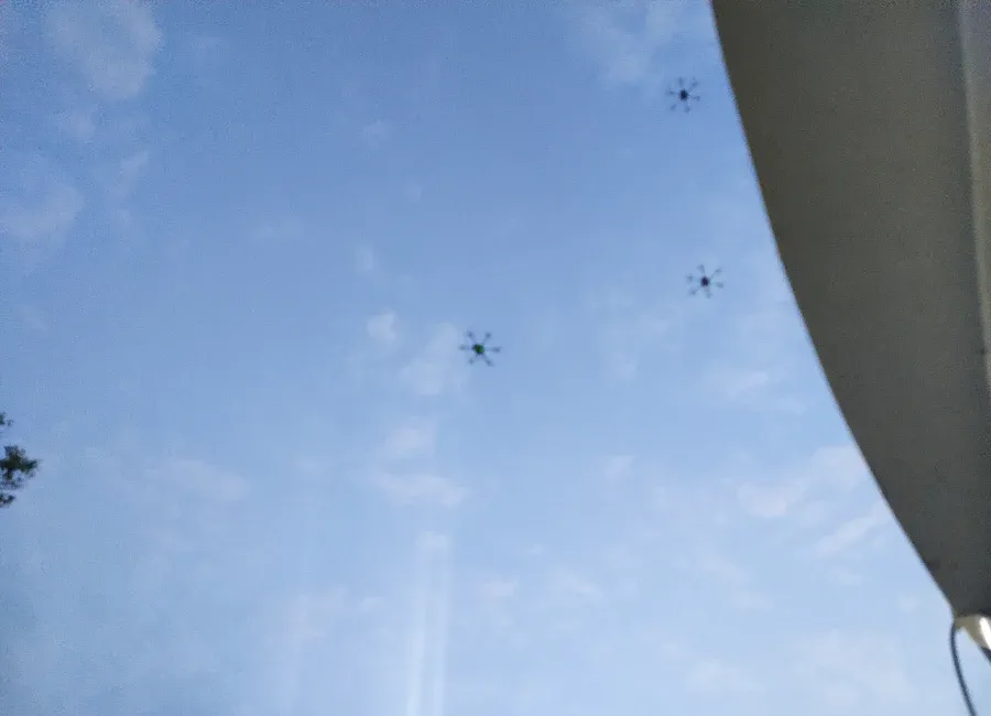 Swarm of three hybrid engine and battery-operated drones